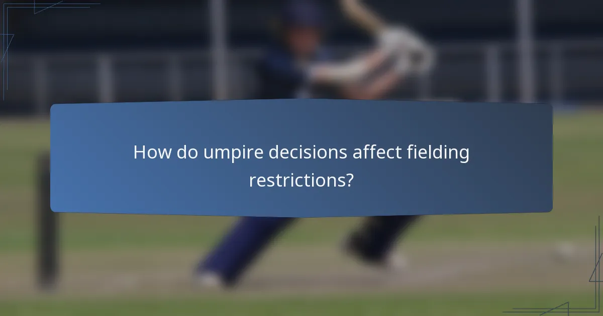 How do umpire decisions affect fielding restrictions?